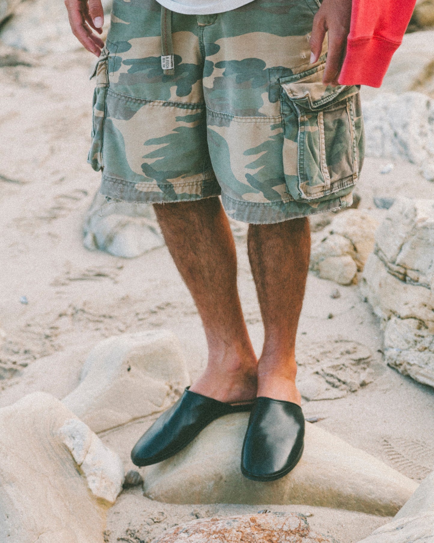 Beachwood The Dume black calf leather mule styled on the rocks in Malibu