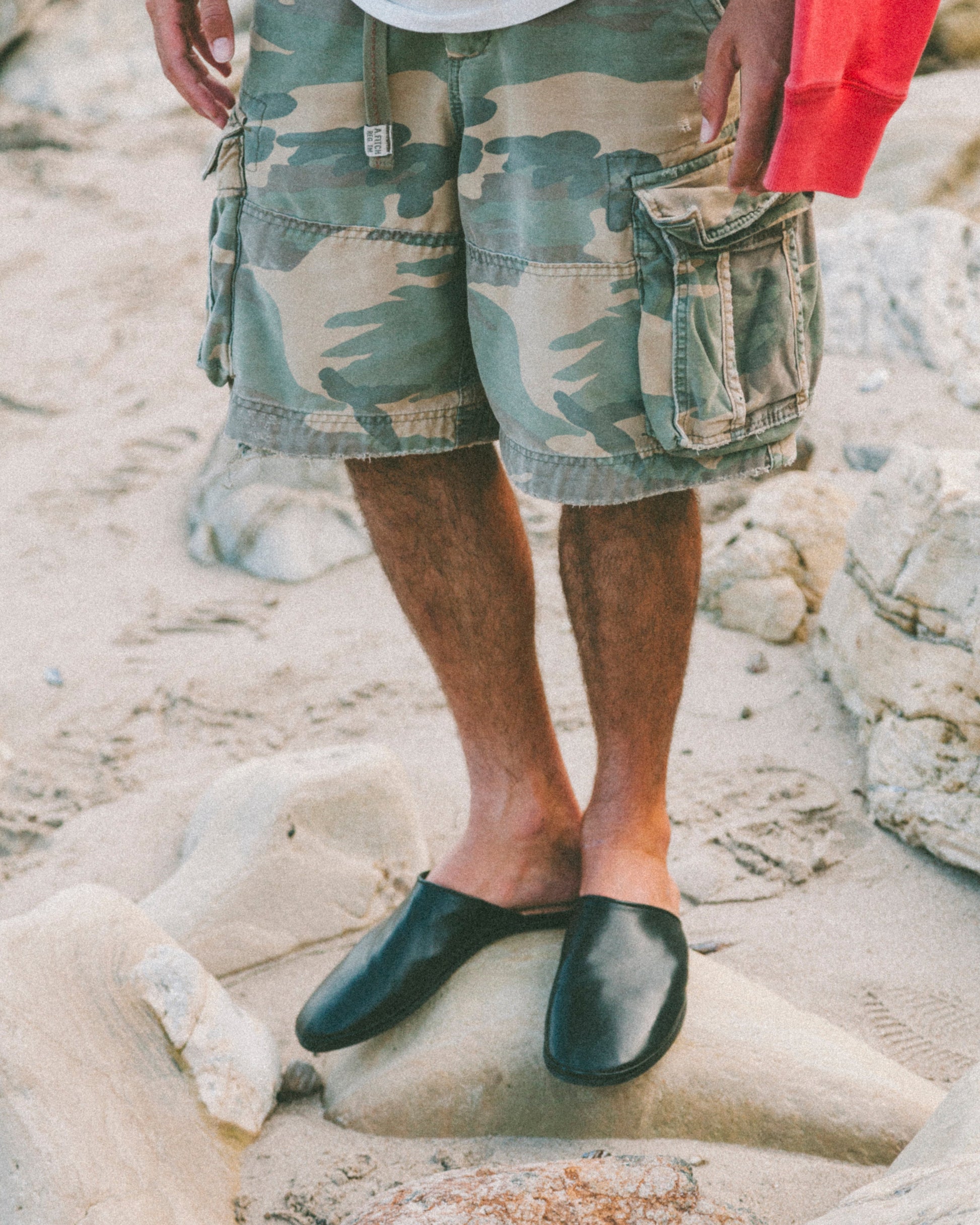 Beachwood The Dume black calf leather mule styled on the rocks in Malibu