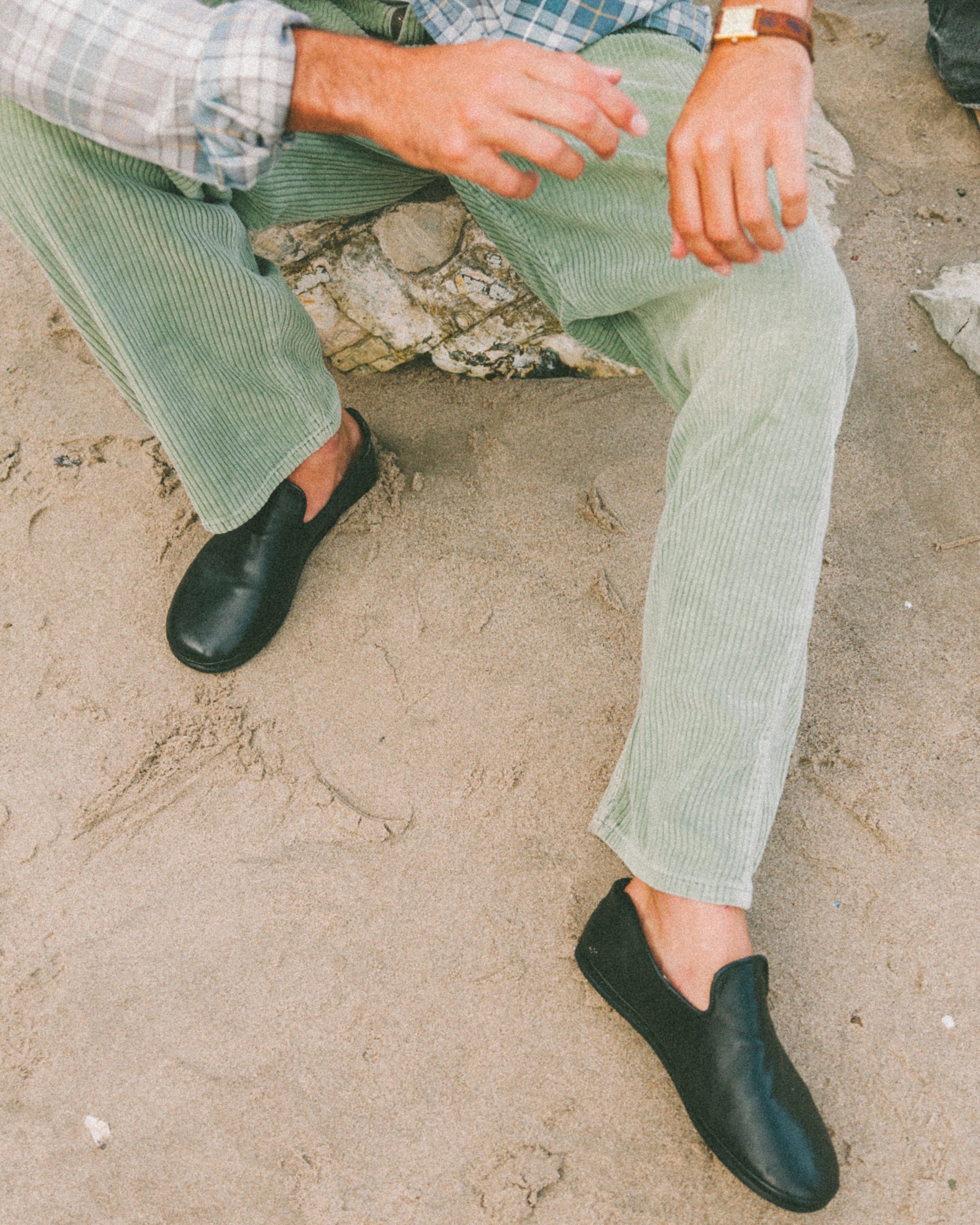 Beachwood The Glen black leather slip-on styled on the beach in Malibu