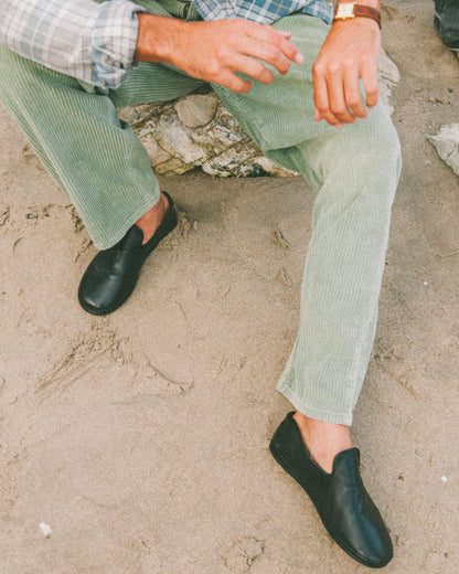 Beachwood The Glen black leather slip-on styled on the beach in Malibu